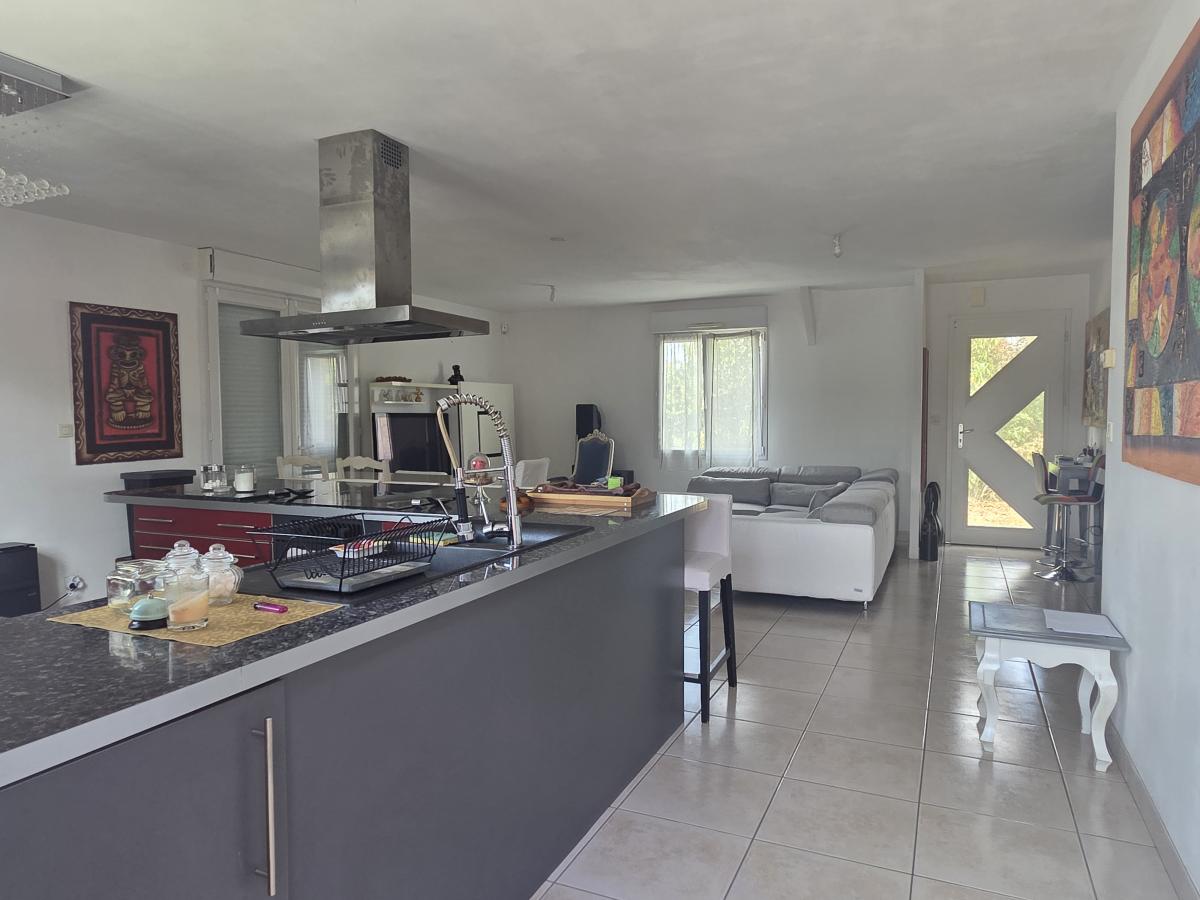 Maison individuelle plain pied 136m² habitables, quatre chambres sur terrain de 1078m²