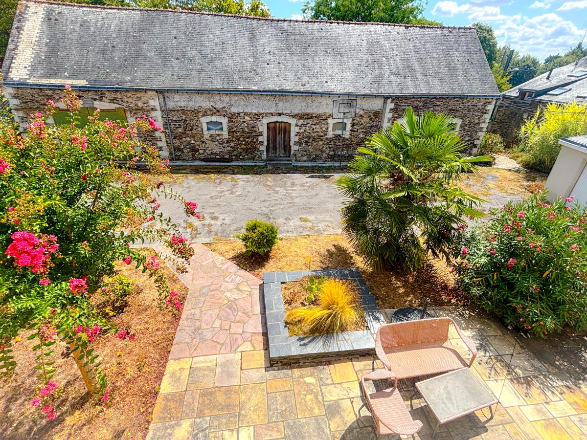 Ensemble immobilier avec un fort potentiel sur parcelle constructible de 1796 m²